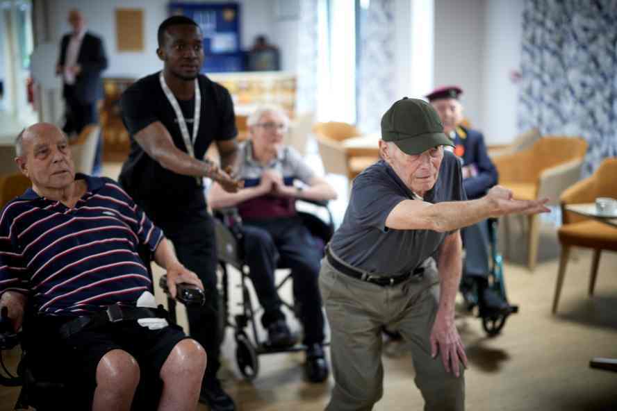 Veterans at Broughton House playing virtual tenpin bowling.JPG